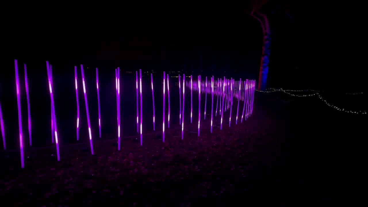 An installation of illuminated light rods